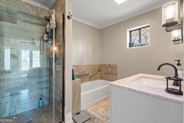bathroom with a shower stall, a bath, a sink, and crown molding