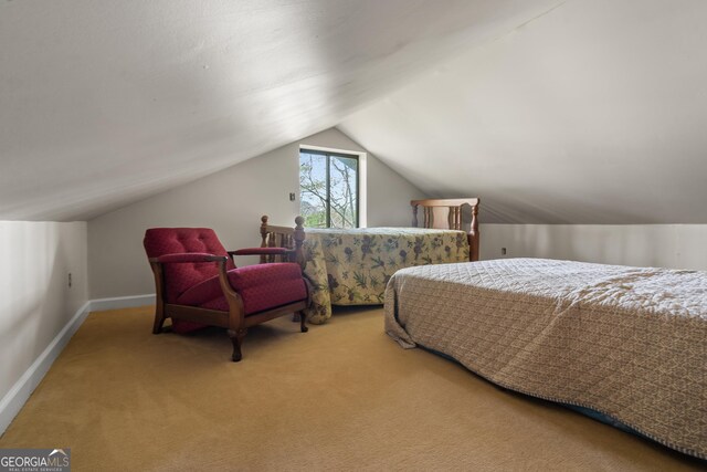 426 Crow Creek Rd, Lakemont, GA 30552 - carpeted bedroom featuring lofted ceiling and baseboards