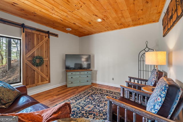 426 Crow Creek Rd, Lakemont, GA 30552 - living room featuring wooden ceiling, a barn door, wood finished floors, and recessed lighting