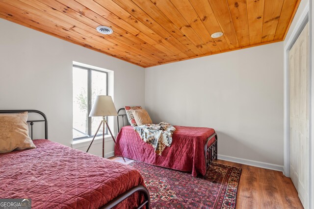 426 Crow Creek Rd, Lakemont, GA 30552 - bedroom with wood finished floors and wood ceiling
