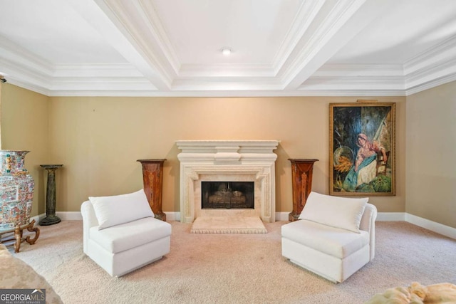 sitting room featuring a fireplace, carpet flooring, baseboards, and ornamental molding