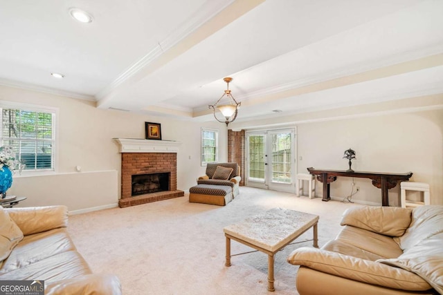 living room with a wealth of natural light, carpet flooring, and crown molding