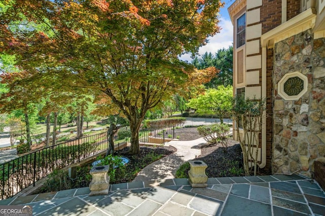 view of patio / terrace with fence