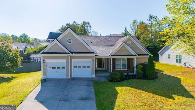 1910 Charleston Oak Cir, Lawrenceville, GA 30043 - view of front of home featuring concrete driveway, a front lawn, and an attached garage
