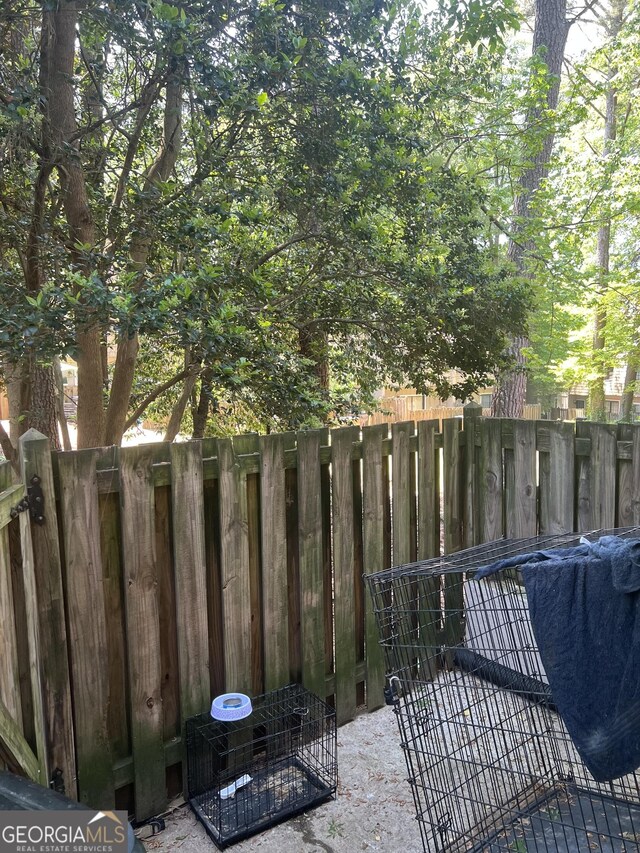 1331 Woodstone Trce, Morrow, GA 30260 - view of patio with fence and a gate