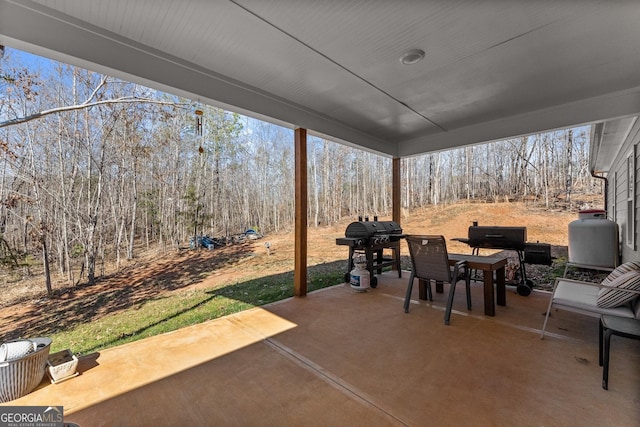 view of patio with a grill