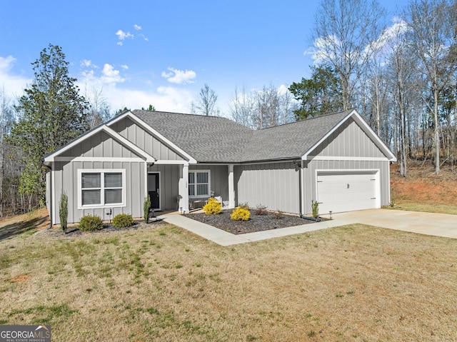 ranch-style house with board and batten siding, driveway, an attached garage, and a front lawn