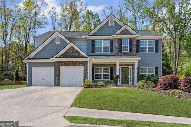 6655 Grove Meadows Ln, Cumming, GA 30028 - craftsman-style house with concrete driveway, a front yard, and stone siding