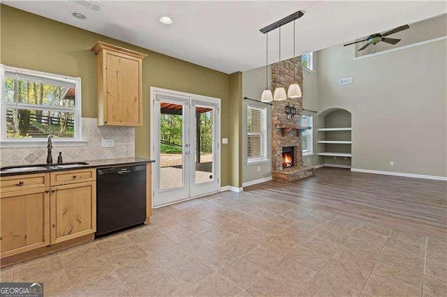 6655 Grove Meadows Ln, Cumming, GA 30028 - kitchen with a wealth of natural light, french doors, a sink, and black dishwasher