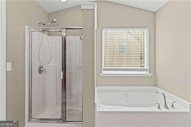 6655 Grove Meadows Ln, Cumming, GA 30028 - full bathroom featuring a bath, a stall shower, and vaulted ceiling