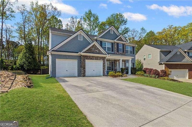 6655 Grove Meadows Ln, Cumming, GA 30028 - craftsman-style house featuring driveway, stone siding, and a front lawn