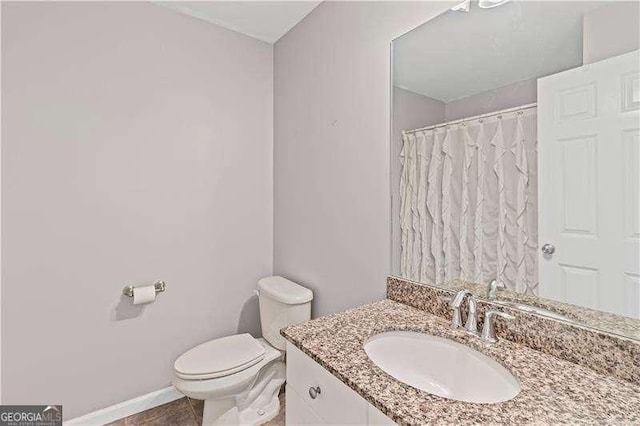 6655 Grove Meadows Ln, Cumming, GA 30028 - full bathroom featuring toilet, curtained shower, vanity, and baseboards