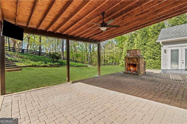 6655 Grove Meadows Ln, Cumming, GA 30028 - view of patio / terrace featuring french doors, ceiling fan, and an outdoor stone fireplace