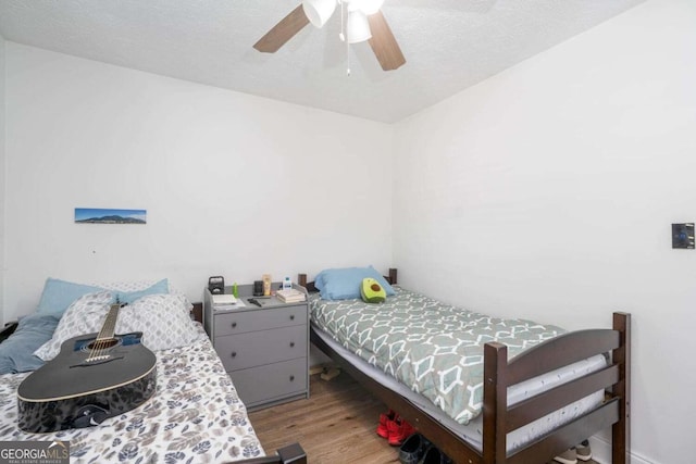 166 Rustin Dr, Dallas, GA 30157 - bedroom featuring wood finished floors and a ceiling fan