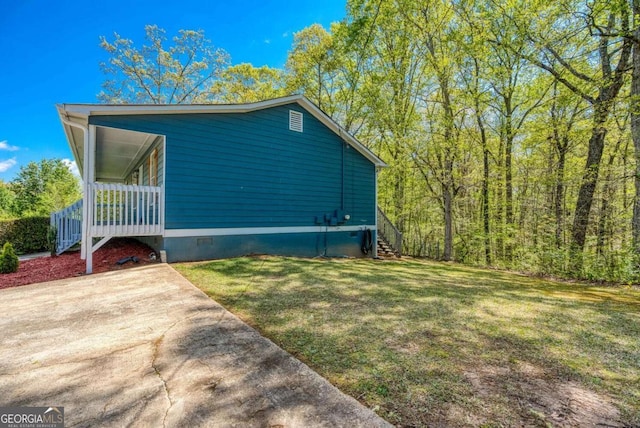 166 Rustin Dr, Dallas, GA 30157 - view of side of home with stairs, a yard, and crawl space