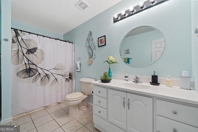 full bathroom featuring visible vents, toilet, a textured ceiling, vanity, and tile patterned flooring