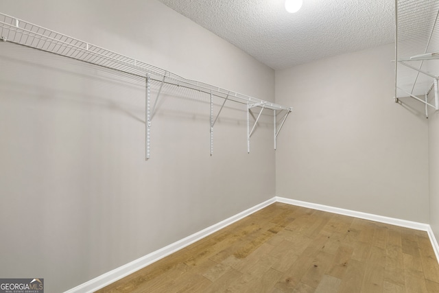 3571 Oakshire Way SE, Atlanta, GA 30354 - walk in closet featuring light wood-style floors