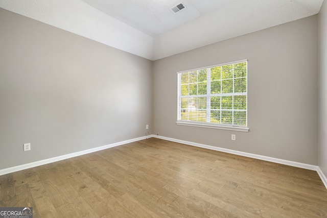 3571 Oakshire Way SE, Atlanta, GA 30354 - unfurnished room featuring wood finished floors, baseboards, and visible vents