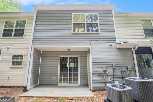 1728 Devon Dr SW, Atlanta, GA 30311 - rear view of house with cooling unit and a patio