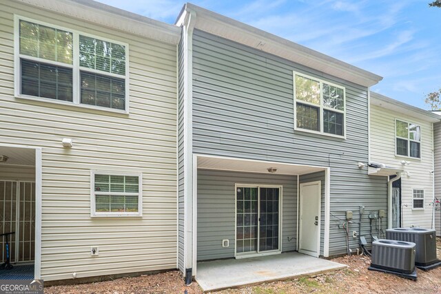 1728 Devon Dr SW, Atlanta, GA 30311 - back of house with cooling unit and a patio area