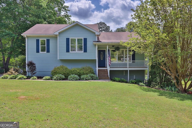 2675 Dacula Ridge Dr, Dacula, GA 30019 - split level home with a front lawn and a porch