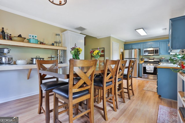 2675 Dacula Ridge Dr, Dacula, GA 30019 - dining space with crown molding and light wood finished floors