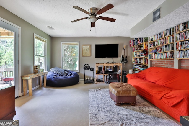 2675 Dacula Ridge Dr, Dacula, GA 30019 - living area with ceiling fan and a textured ceiling