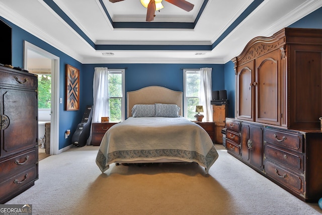 2675 Dacula Ridge Dr, Dacula, GA 30019 - bedroom with a tray ceiling, light colored carpet, ornamental molding, and a ceiling fan
