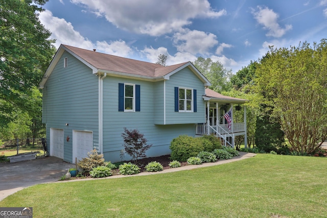 2675 Dacula Ridge Dr, Dacula, GA 30019 - view of front facade with a garage, stairway, driveway, covered porch, and a shingled roof
