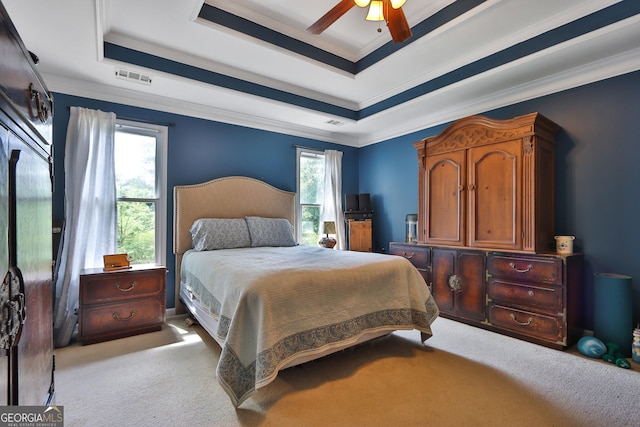 2675 Dacula Ridge Dr, Dacula, GA 30019 - carpeted bedroom featuring a tray ceiling, crown molding, multiple windows, and ceiling fan