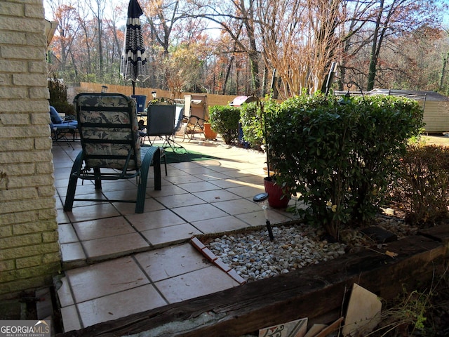 4213 Janice Dr, Atlanta, GA 30337 - view of patio with outdoor dining area and fence