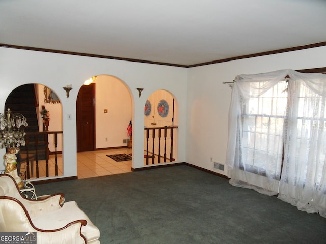 4213 Janice Dr, Atlanta, GA 30337 - interior space featuring arched walkways, baseboards, ornamental molding, and visible vents