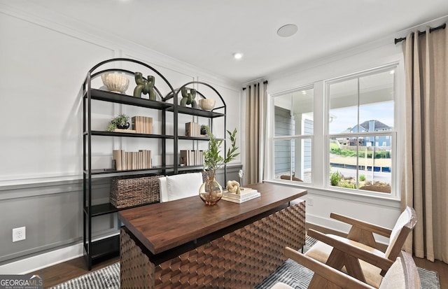 dining room with baseboards, ornamental molding, recessed lighting, wood finished floors, and a wainscoted wall