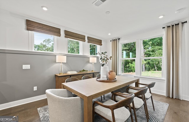 dining space featuring visible vents, baseboards, recessed lighting, and wood finished floors