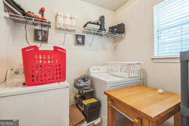 laundry area featuring laundry area and washing machine and dryer