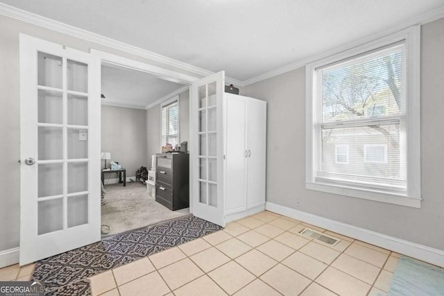 interior space featuring ornamental molding, french doors, visible vents, and light tile patterned floors