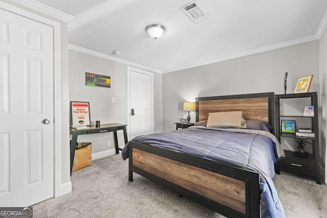 bedroom featuring crown molding, baseboards, carpet, and visible vents