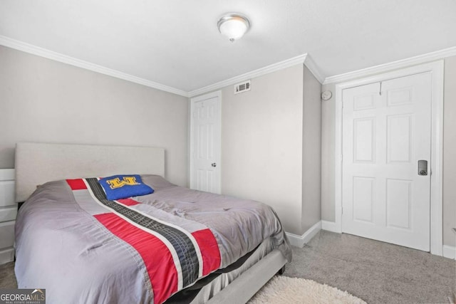 bedroom featuring crown molding, visible vents, baseboards, and carpet flooring