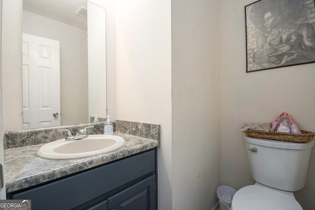 286 Opal St, Luthersville, GA 30251 - half bathroom featuring vanity, toilet, and visible vents