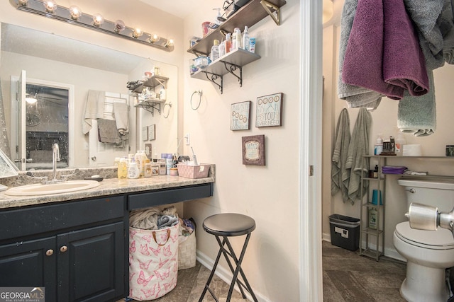 286 Opal St, Luthersville, GA 30251 - bathroom featuring vanity, baseboards, and toilet