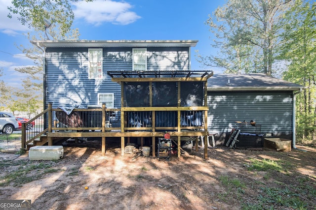 286 Opal St, Luthersville, GA 30251 - rear view of property featuring a wooden deck and a sunroom