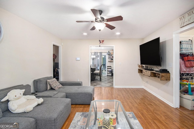 286 Opal St, Luthersville, GA 30251 - living room featuring light wood-style floors, baseboards, a ceiling fan, and recessed lighting