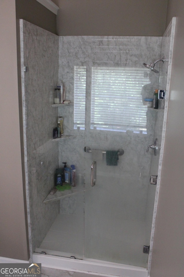 full bathroom featuring a stall shower