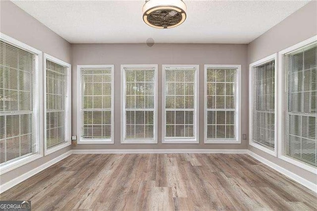 328 Allatoona Shores Dr, Canton, GA 30114 - unfurnished sunroom featuring wood finished floors and baseboards
