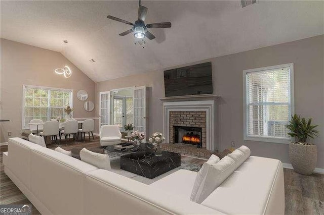 328 Allatoona Shores Dr, Canton, GA 30114 - living area featuring baseboards, a brick fireplace, visible vents, ceiling fan, and wood finished floors