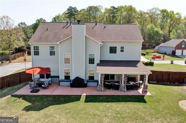 209 Crestmont Way, Canton, GA 30114 - rear view of house with outdoor lounge area, a patio area, and roof with shingles