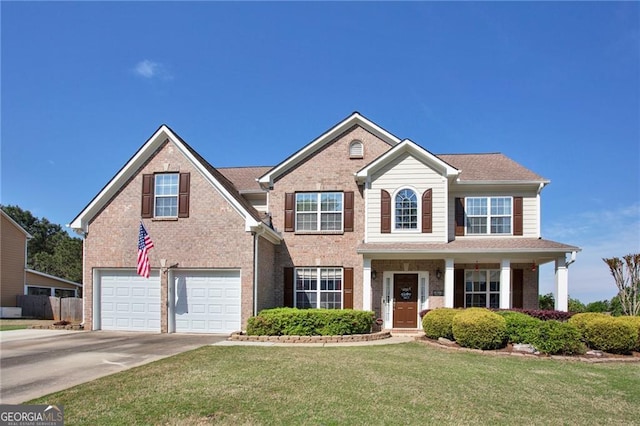 209 Crestmont Way, Canton, GA 30114 - traditional-style home with driveway, an attached garage, a front lawn, and brick siding