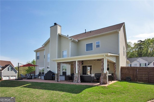 209 Crestmont Way, Canton, GA 30114 - rear view of house featuring a patio area, an outdoor hangout area, and a chimney