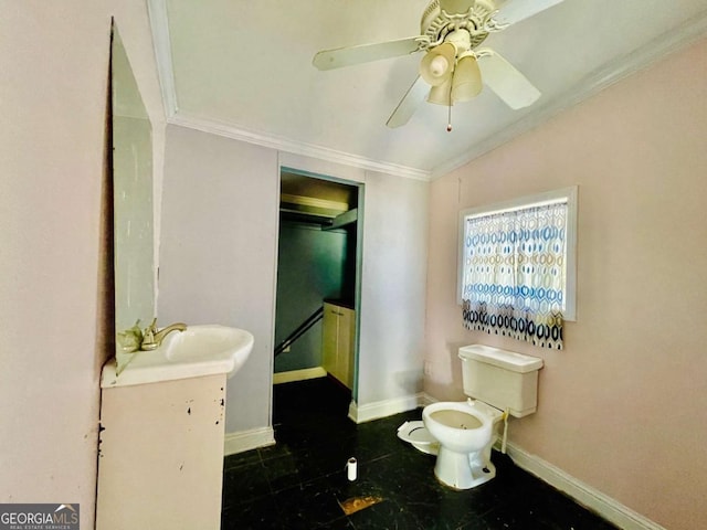 1546 Bob Mann Rd, Maysville, GA 30558 - bathroom with ceiling fan, ornamental molding, toilet, a sink, and baseboards
