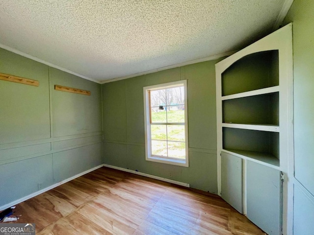 1546 Bob Mann Rd, Maysville, GA 30558 - empty room featuring a textured ceiling and ornamental molding